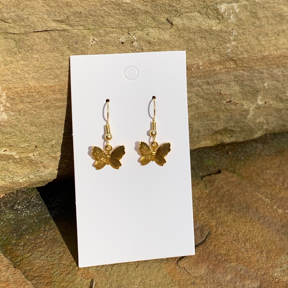 Hand made gold colored butterfly earrings